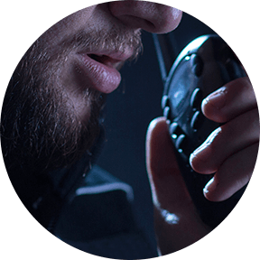 Officer speaking on walkie talkie